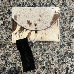 BNWT cow leather fur 4” x 3” mini card/cash holder very cute! Great gift too!
